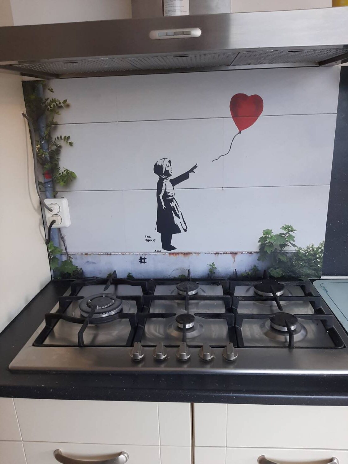 Keuken achterwand van een Banksy kunstwerk